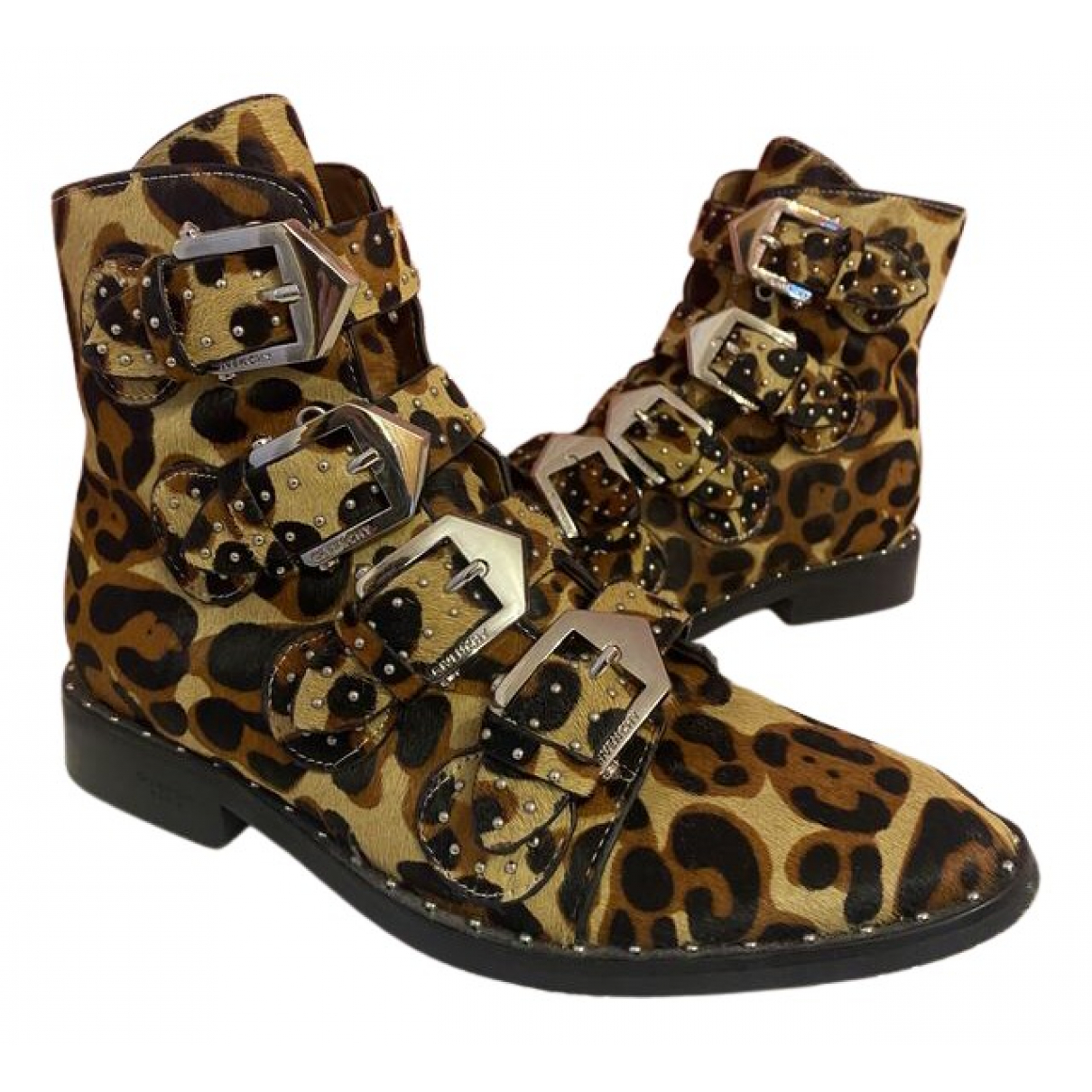 Givenchy Faux fur buckled boots - Givenchy - Modalova