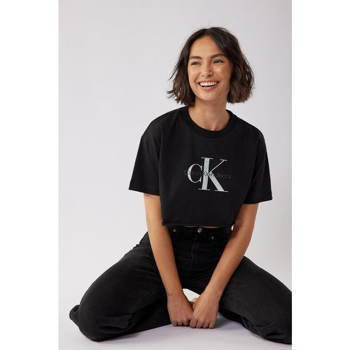 Organisches kurzes T-Shirt mit ungenähtem Saum - Black - Calvin Klein for NA-KD - Modalova
